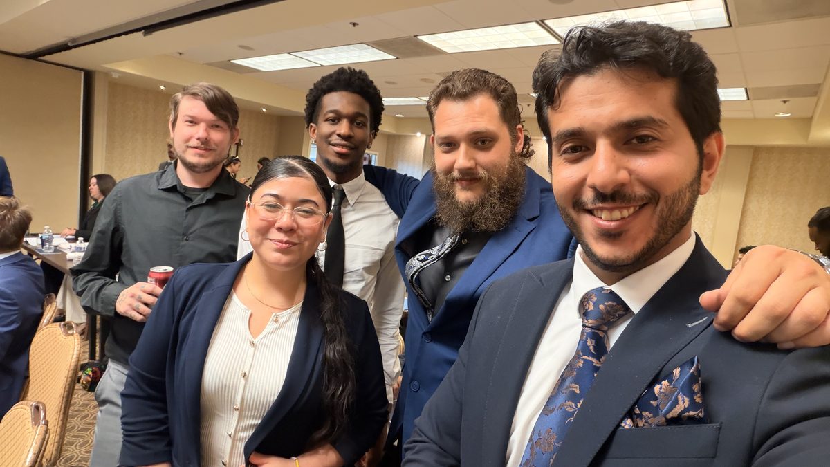 Members of the Feather and Scale Marketing team together at a company event in North Texas